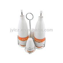 set of 4 oil and vinegar cruet sets with metal stand